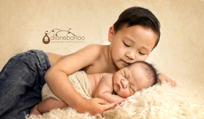 newborn boy with brother photo riverside