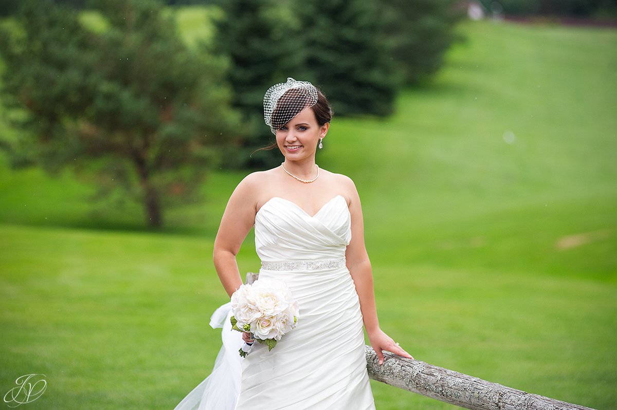 gorgeous bridal portrait in soft rain