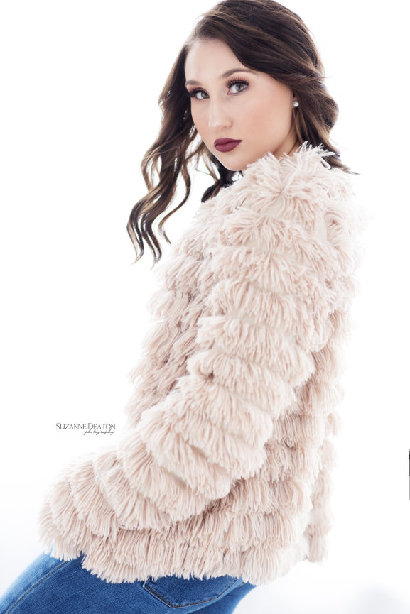 AND THE WINNER OF OUR 2025 SENIOR MAGAZINE COVER CONTEST IS . . .