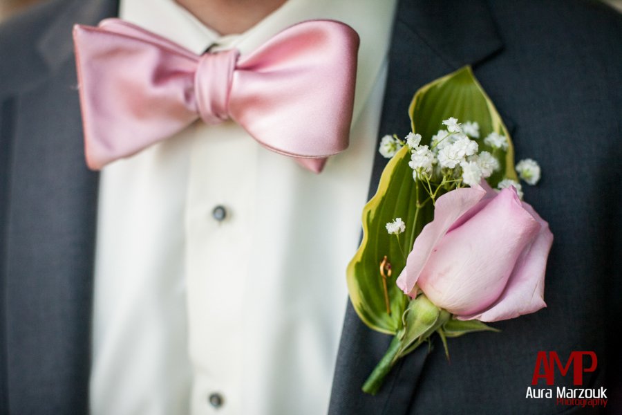 Pink bowtie and pink rose boutonniere look fabulous in this green and pink Winston Salem wedding. © Aura Marzouk Photography. 