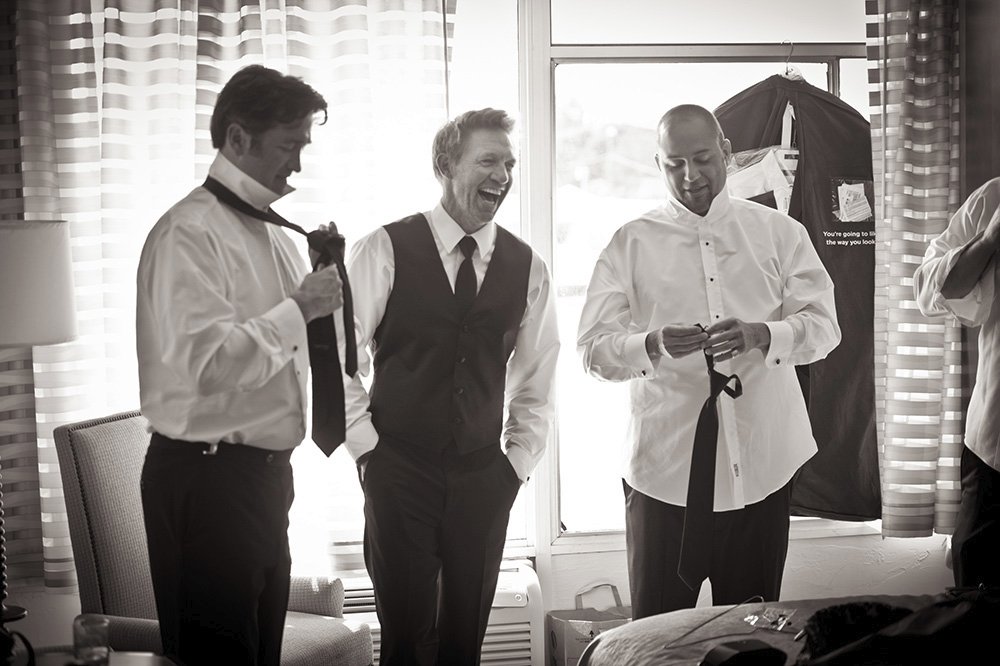 Groomsmen getting ready for oceanside wedding at Clement Intercontinental