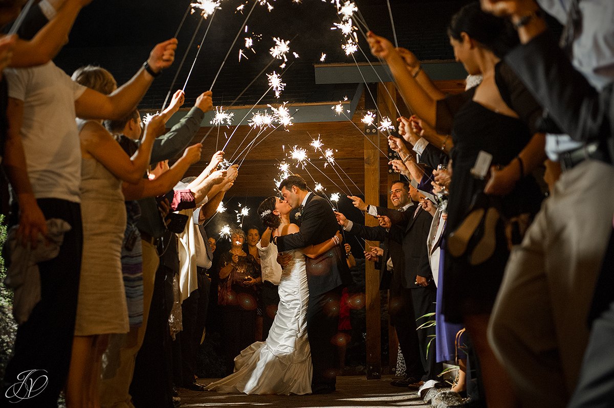 romantic bride and groom sparklers exit photo