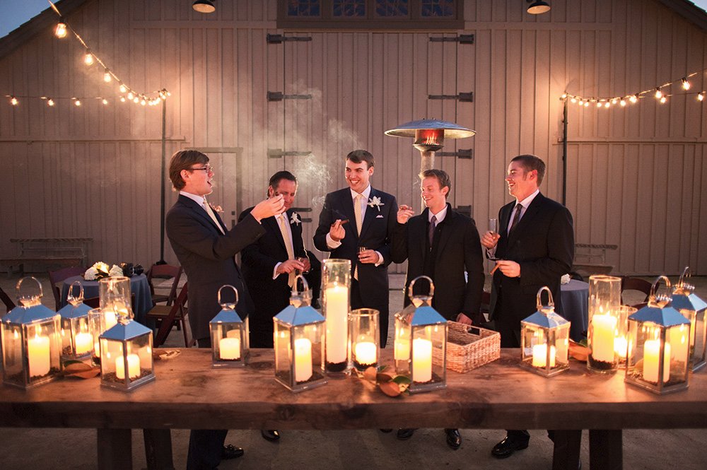smoking cigars with candle lamps at Santa Lucia Preserve