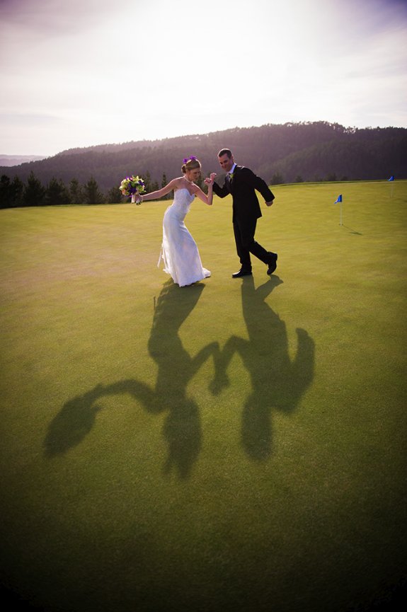 Bride & groom shadow dancing at Clint Eastwood’s Country Club
