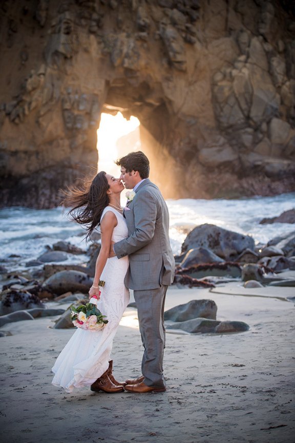 Hollywood couple in front of Pfeiffer Beach Arch  Big Sur