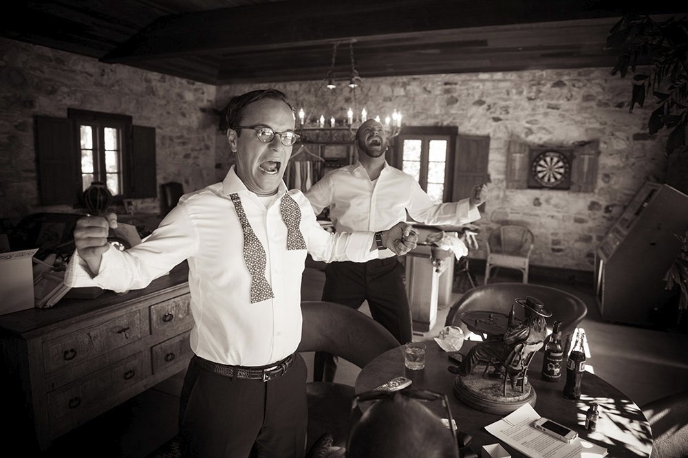 crazy groomsman at Holman Ranch game room