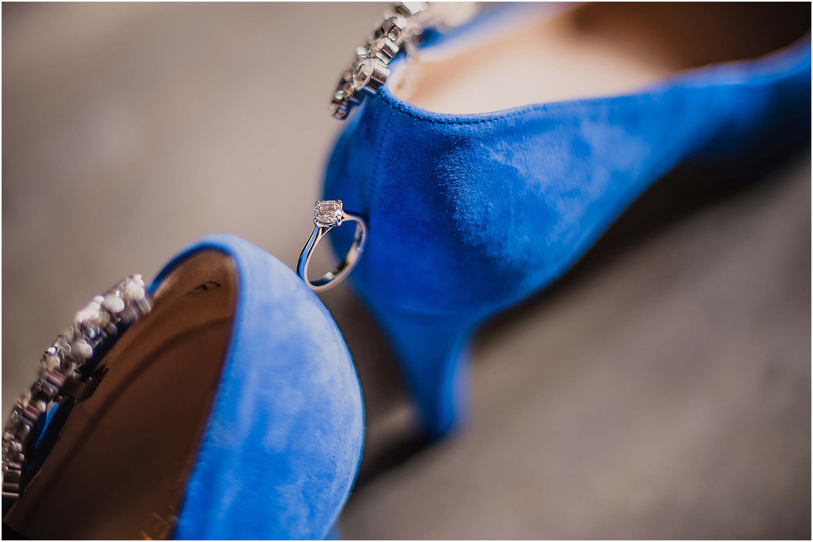 engagement ring shot on bridal shoes