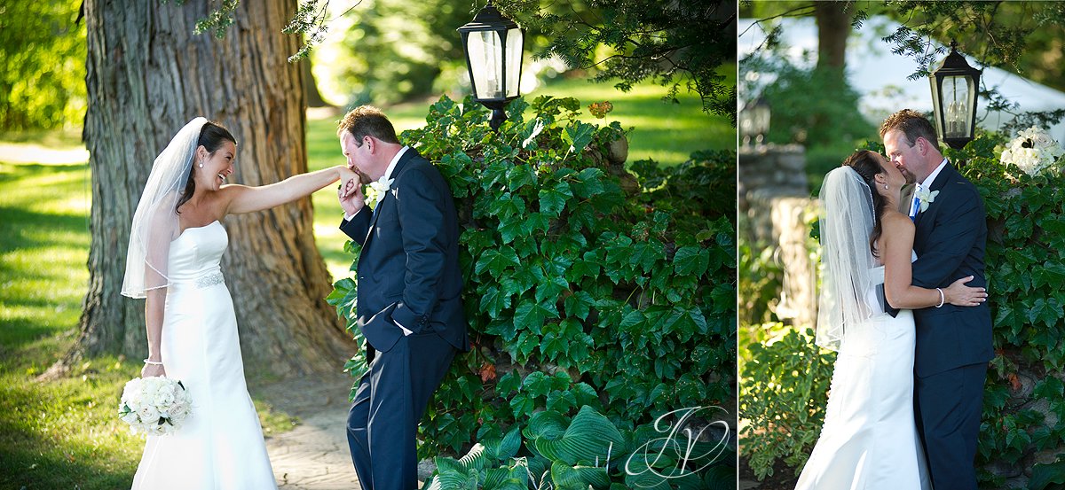 bride kissing groom photo, wedding ceremony photo, riverstone manor, schenectady wedding photographer