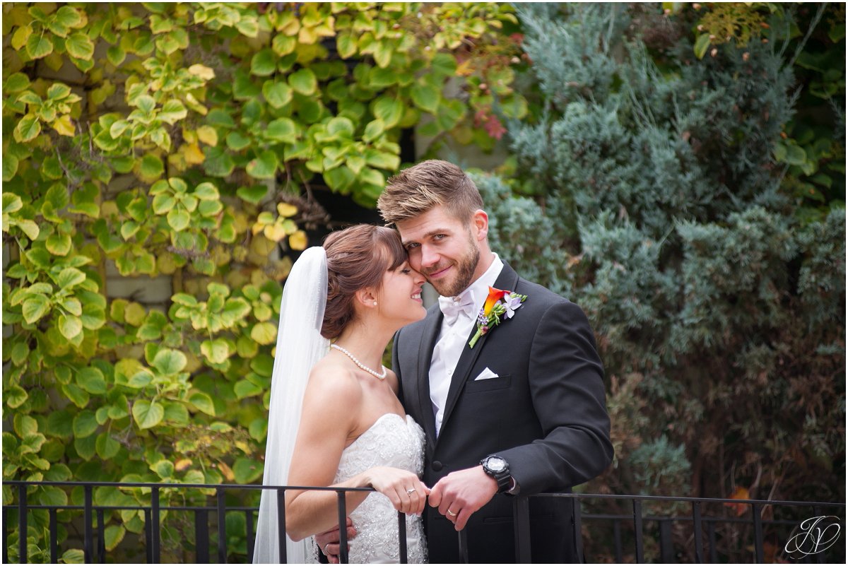 bride nuzzling groom glen sanders mansion wedding