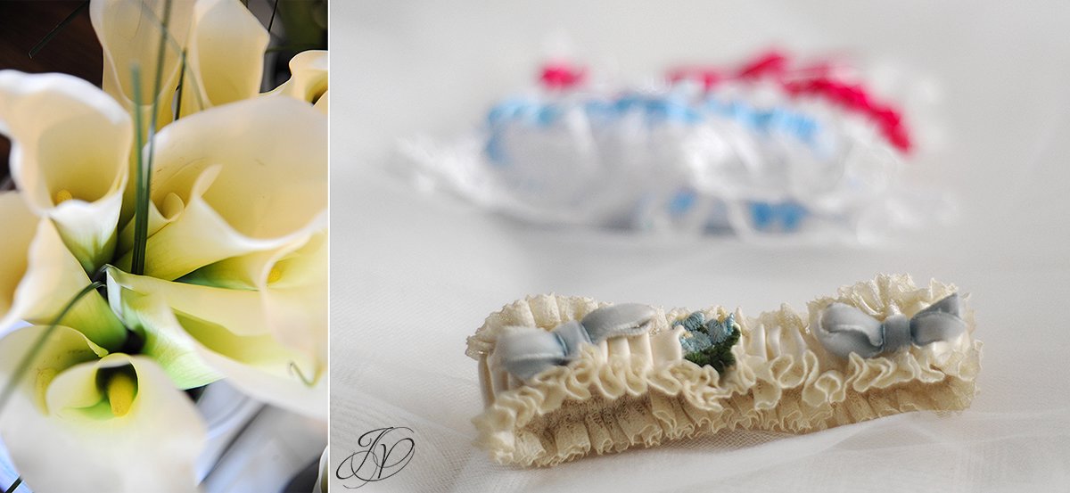 close up photo of calla lily bridal boquet, bridal garter, something blue