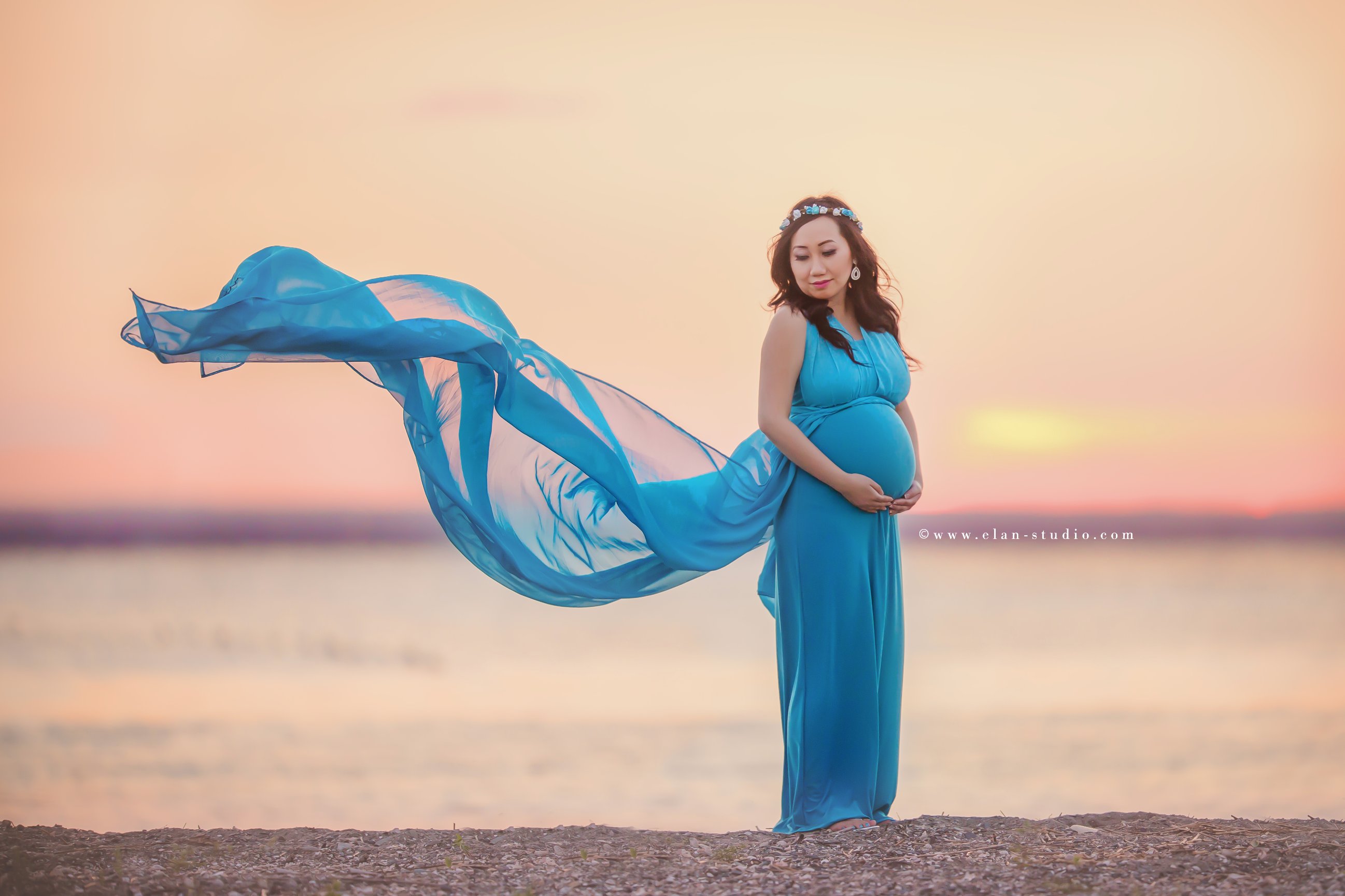 pregnant mother wearing blue flowing dress, Rhode Island beach