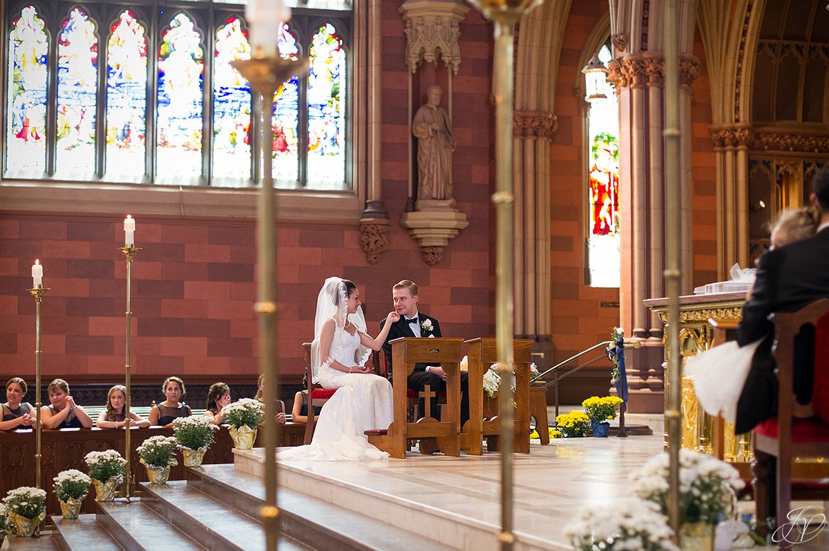 candid bride and groom photo during ceremony