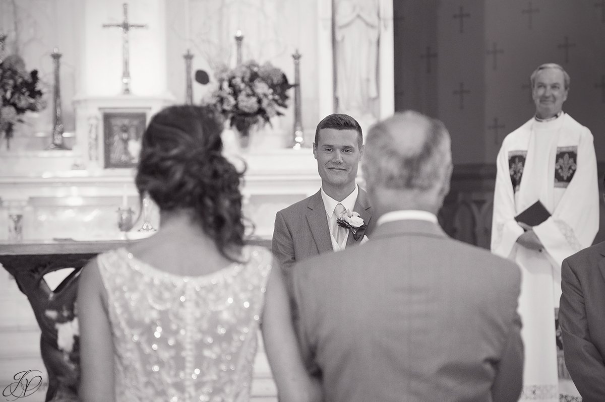 groom seeing bride for the first time during ceremony