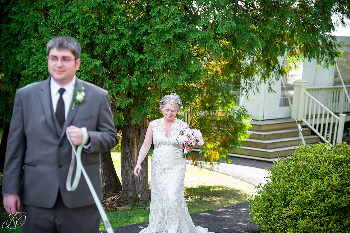 bride preparing for first look with groom