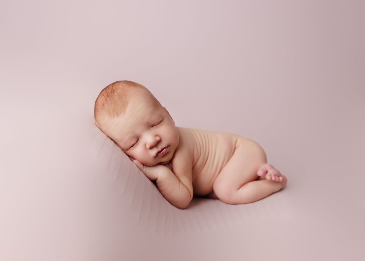 Sleeping newborn baby in soft blanket - Orlando newborn photographer