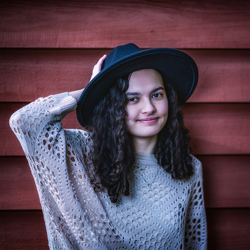 Application-only senior portrait session at a Galveston beach at sunrise in Houston Metro, bespoke joyful by Swartz Portraits