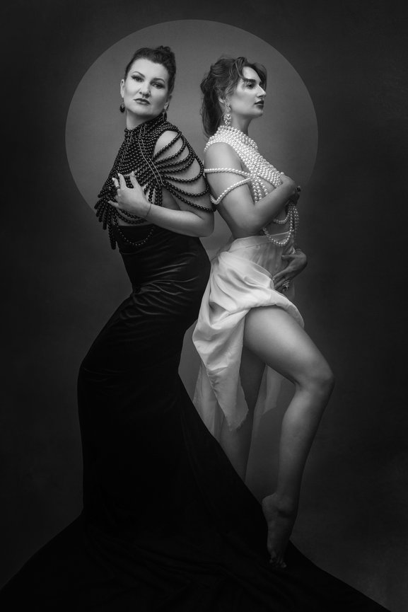 Artistic black-and-white portrait of Mother and Daughter.