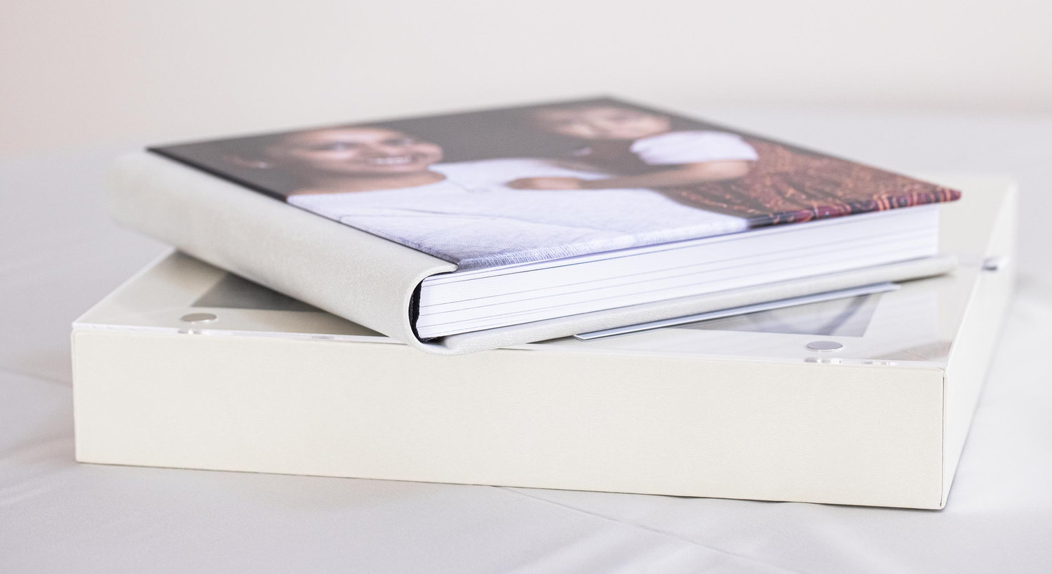 fine art portrait album with printed images displayed on a clean surface