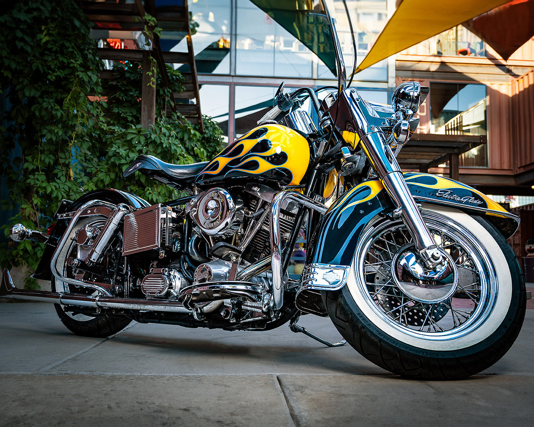 Custom Harley-Davidson Electra Glide motorcycle with flame detailing, captured during a professional photoshoot in Springville, Utah. Photo shoot by Tre Nelson Photo.