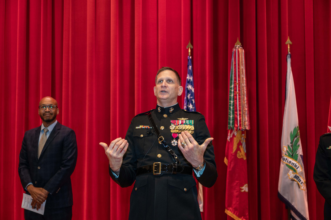 USMC Officer giving his remarks at his retirement ceremony photographed by Laura Hatcher Photography