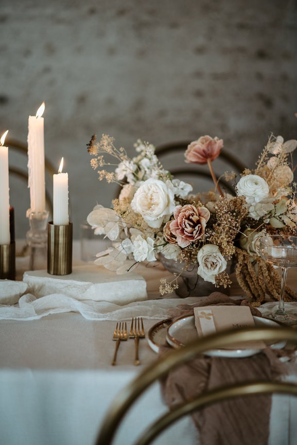 Fine art floral arrangement with a mix of fresh and dried flowers