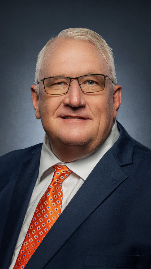 man in suit on classic old master background for a classy headshot
