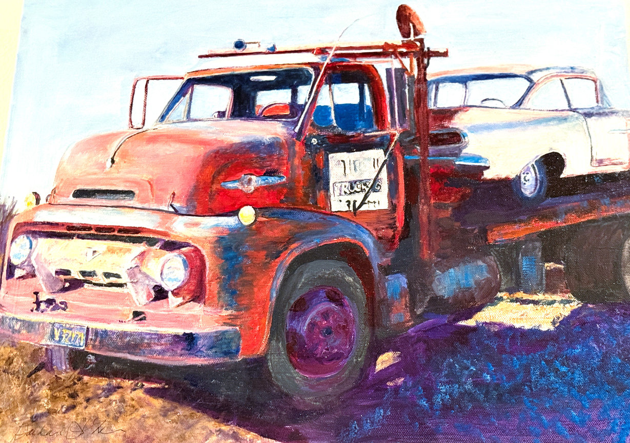 Watercolor painting of a red vintage tow truck on a dirt road.
