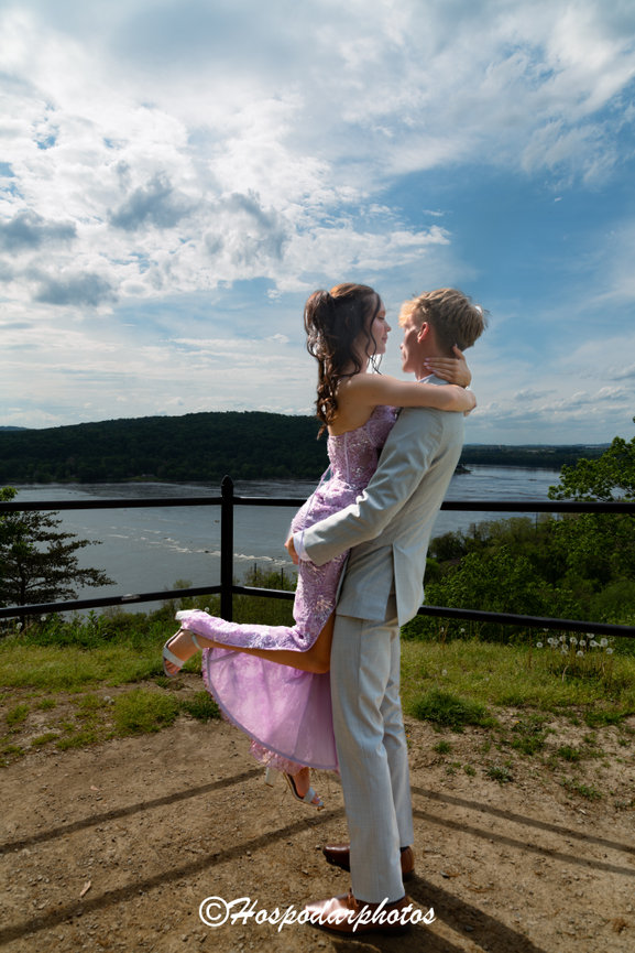 Couple embracing outdoors at a wedding