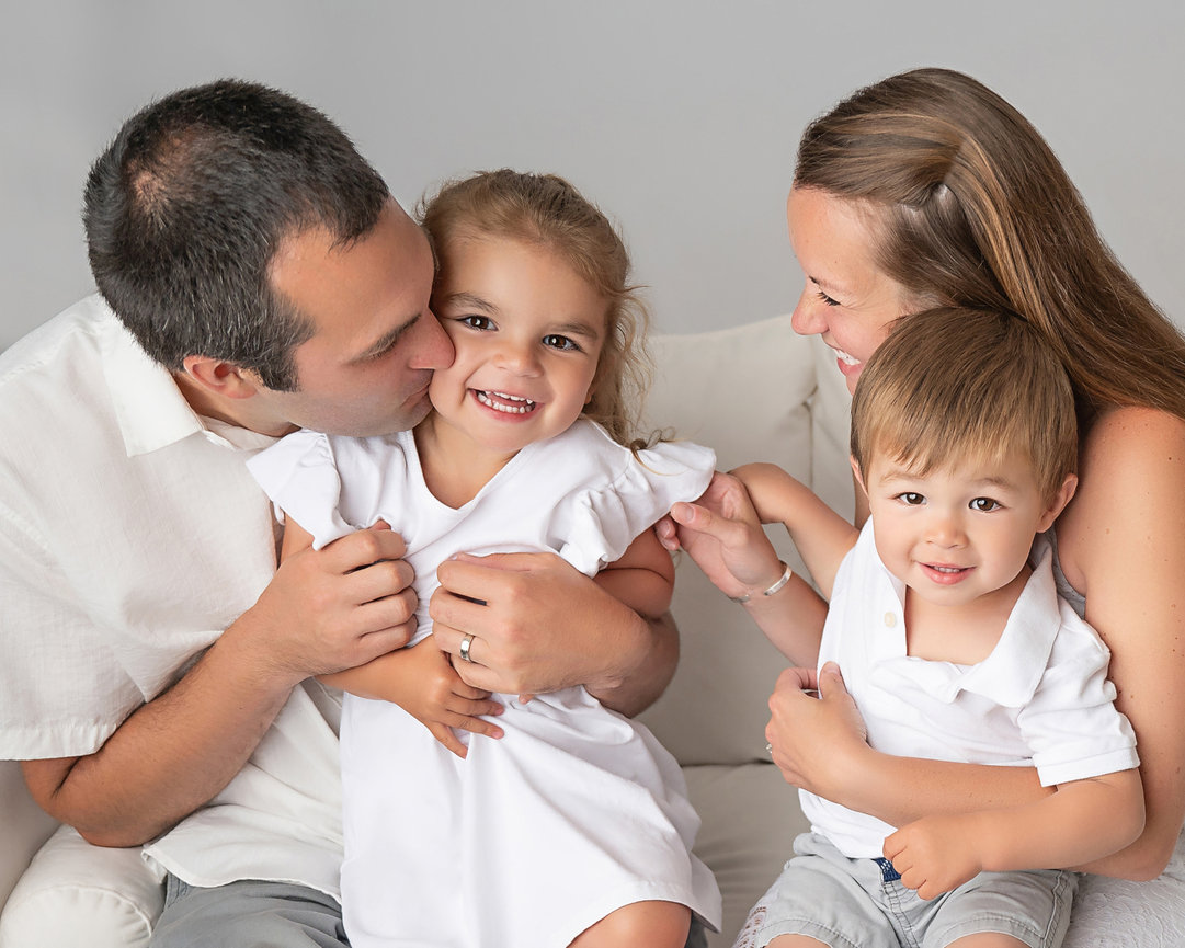Princeton family’s minimalist studio portrait on white backdrop