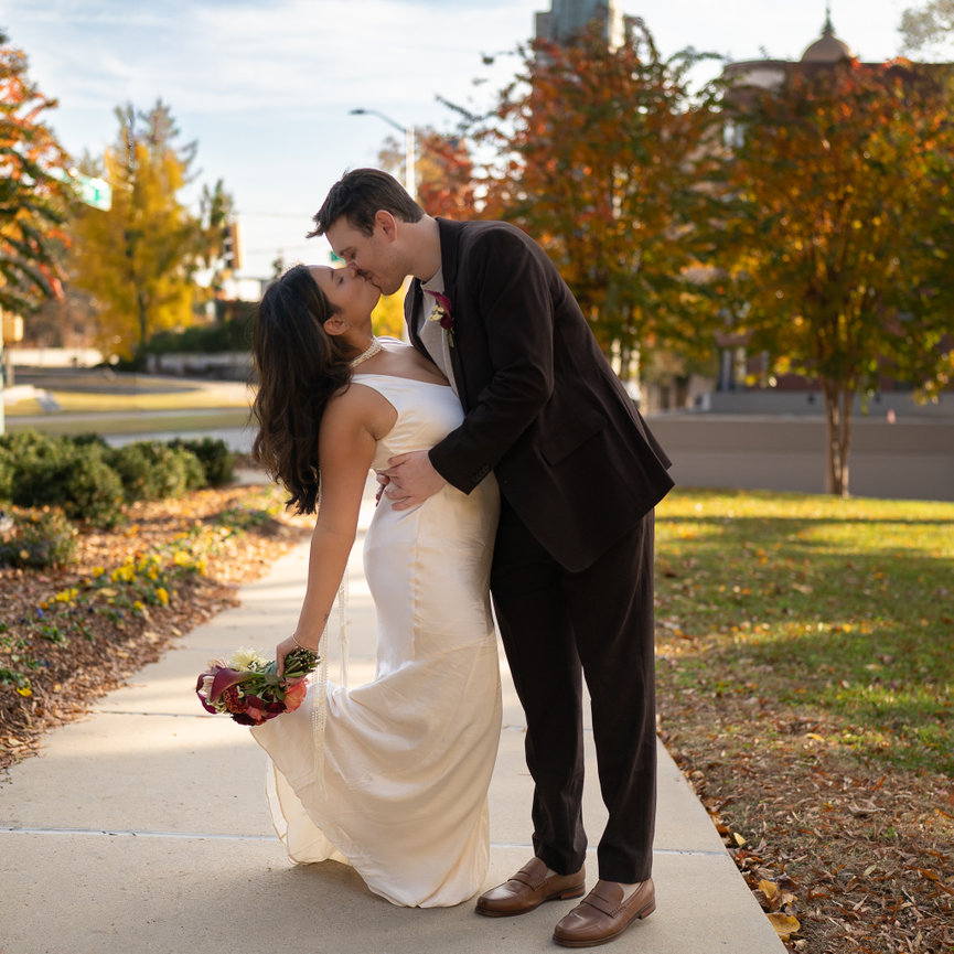Couple dancing in a city setting