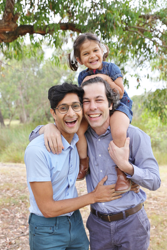 relaxed family smiling outdoors