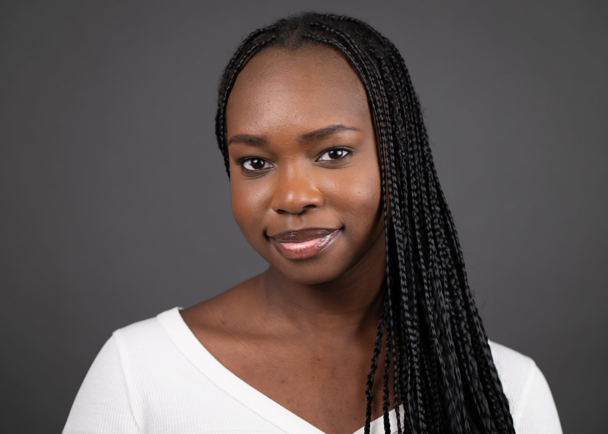 Smiling woman in white sweater
