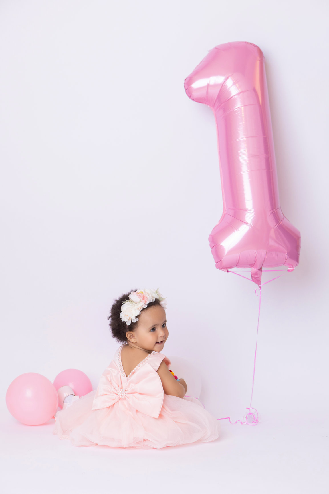Calgary cake smash photography pink balloons tulle and bubbles first birthday session photo 13