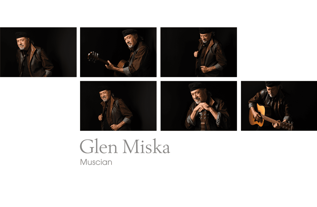 Musician Glen Miska wearing a leather vest and playing his guitar in the Kliks Photography studio.