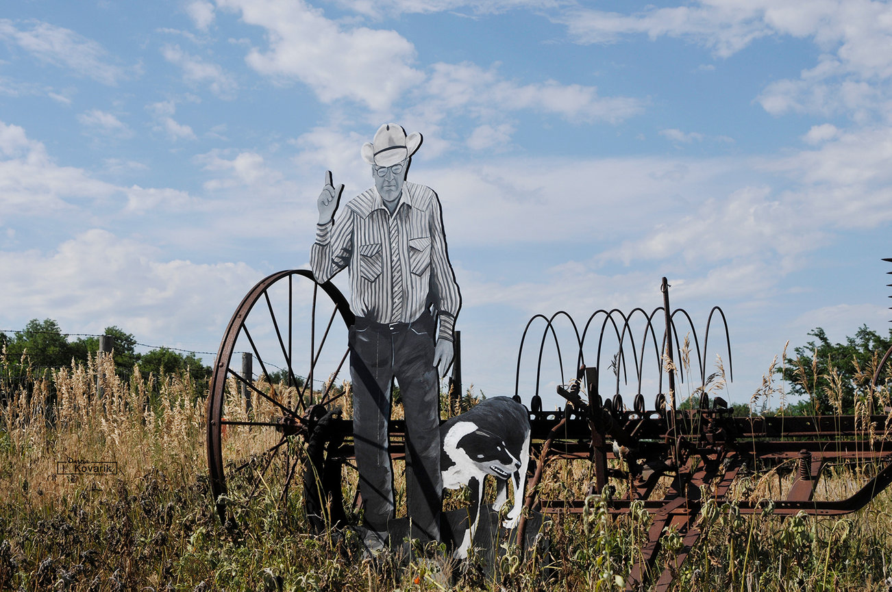 A Taylor 'Villager' located at the Custer/Loup County line in Nebraska of a local land owner and his dog.